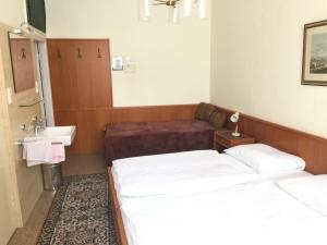 Postel nebo postele na pokoji v ubytování Pension Reimer