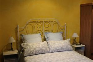 Una cama o camas en una habitación de Hotel Restaurante Sonsoles