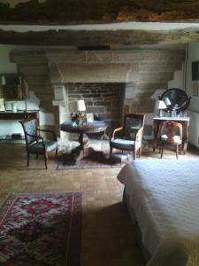 Letto o letti in una camera di Manoir de Kerguéréon