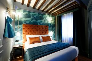 Ένα ή περισσότερα κρεβάτια σε δωμάτιο στο Saint B Boutique Hotel STB