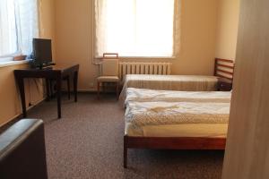 
Łóżko lub łóżka w pokoju w obiekcie Apartamenty Zacisze
