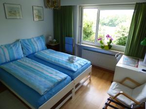 Letto o letti in una camera di B&B Pappelweg - 2