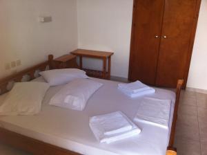Postel nebo postele na pokoji v ubytování Hotel Sevilli