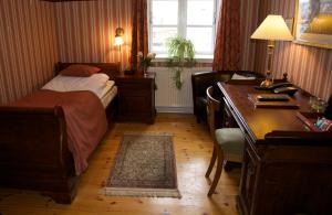 Postel nebo postele na pokoji v ubytování Hotel Ærø