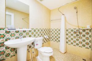 Koupelna v ubytování Le Hua Hotel + 29 fotografií
