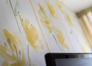 Televízia a/alebo spoločenská miestnosť v ubytovaní ACasaMia WelcHome Hotel