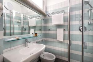 Kúpeľňa v ubytovaní ACasaMia WelcHome Hotel