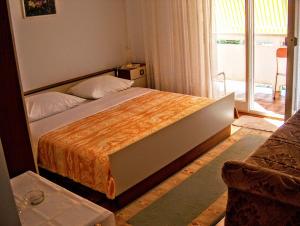 Postel nebo postele na pokoji v ubytování Guest House Mireja