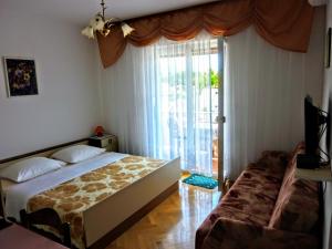 Ένα ή περισσότερα κρεβάτια σε δωμάτιο στο Guest House Mireja