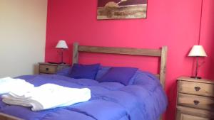 Giường trong phòng chung tại Temporario en Villa Sol +21 ảnh