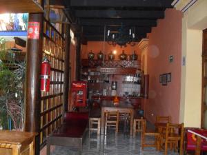 El lounge o bar de Hotel La Casona