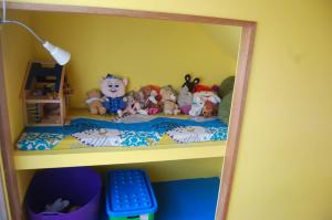 a toy bunk bed with stuffed animals on it at Minshuku Namisou in Iriomote
