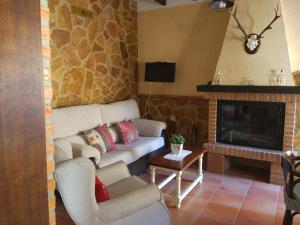 TV a/nebo společenská místnost v ubytování Casa Rural Sierra De Coripe
