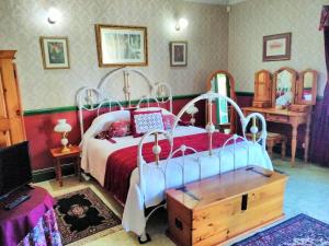 A Pilgrims Rest客房内的一张或多张床位