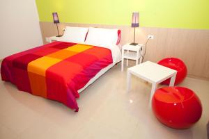 Postel nebo postele na pokoji v ubytování Sicily Rooms Enna