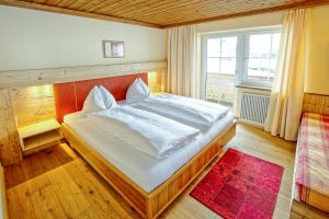 Posteľ alebo postele v izbe v ubytovaní Romantik Pension Lehrberg