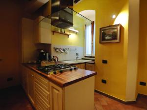 Cuisine ou kitchenette dans l'établissement Residenza Raffaello