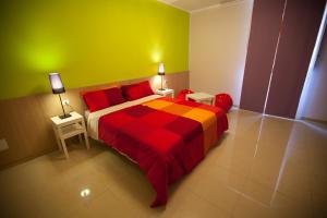 Postel nebo postele na pokoji v ubytování Sicily Rooms Enna