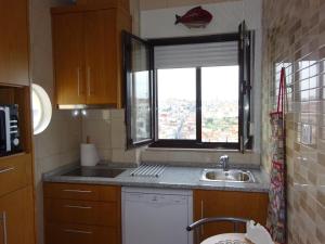 Virtuvė arba virtuvėlė apgyvendinimo įstaigoje Bom dia Porto