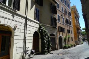 a bike parked on the side of a building at Roman Forum Suite in Rome