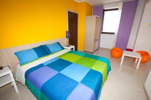 Postel nebo postele na pokoji v ubytování Sicily Rooms Enna