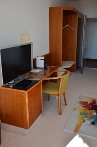 TV a/nebo společenská místnost v ubytování Hotel Garni Reulein