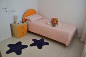 Łóżko lub łóżka w pokoju w obiekcie La Casa Di Melory