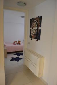 Łóżko lub łóżka w pokoju w obiekcie La Casa Di Melory
