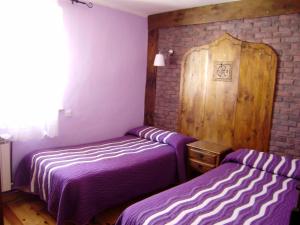Tempat tidur dalam kamar di Casa Rural La Coja