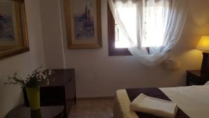 Łóżko lub łóżka w pokoju w obiekcie Villa Vid-Bil Calpe