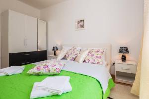 Postel nebo postele na pokoji v ubytování APARTMENT "Patricia"