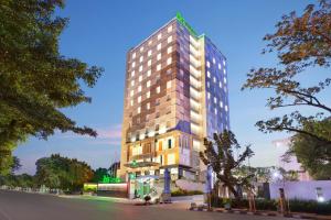 a rendering of a tall building at Ibis Styles Makassar Sam Ratulangi in Makassar