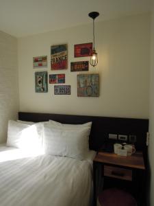 Postel nebo postele na pokoji v ubytování Re-Change Hotel Taipei