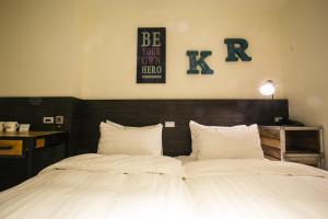Postel nebo postele na pokoji v ubytování Re-Change Hotel Taipei