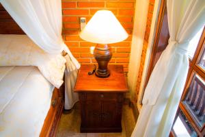 Postel nebo postele na pokoji v ubytování Ari La Homestay