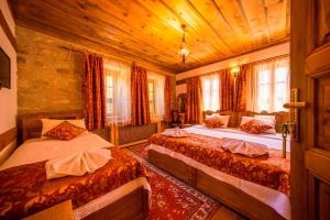 เตียงในห้องที่ Akbulut Konak