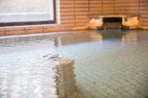 Bazén v ubytování Hotel Umenoyu nebo v jeho okolí