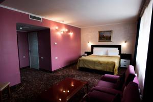 Ένα ή περισσότερα κρεβάτια σε δωμάτιο στο Erebuni Hotel Yerevan