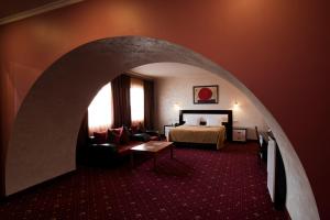 Ένα ή περισσότερα κρεβάτια σε δωμάτιο στο Erebuni Hotel Yerevan