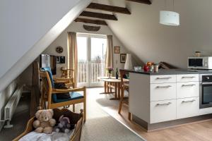 Kuchyň nebo kuchyňský kout v ubytování Hotel Lolland