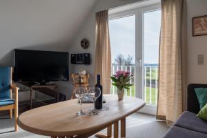 TV a/nebo společenská místnost v ubytování Hotel Lolland