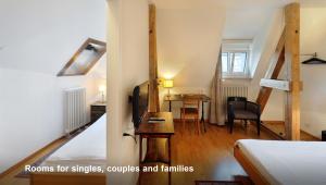 Postel nebo postele na pokoji v ubytování Hotel National Bern