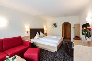 Ένα ή περισσότερα κρεβάτια σε δωμάτιο στο Hotel Puint
