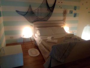 Postel nebo postele na pokoji v ubytování Relais Villa Lézard
