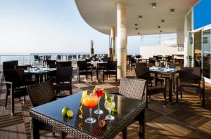 The Beachfront - Praia D'El Rey Golf & Beach Resort 레스토랑 또는 맛집