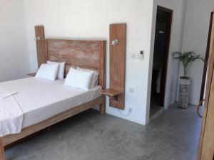 Voodi või voodid majutusasutuse Jippie The Villa toas