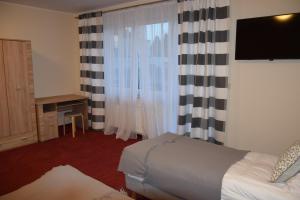 Posteľ alebo postele v izbe v ubytovaní Botanik Hostel