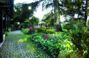 Vonkajšia záhrada v ubytovaní Malpassuti Resort