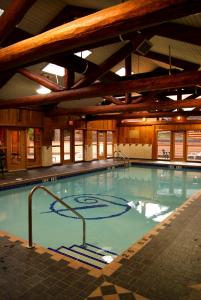 a large swimming pool in a large building at Tigh-Na-Mara Seaside Spa Resort in Parksville