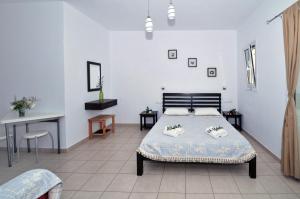 Letto o letti in una camera di Elea Apartments